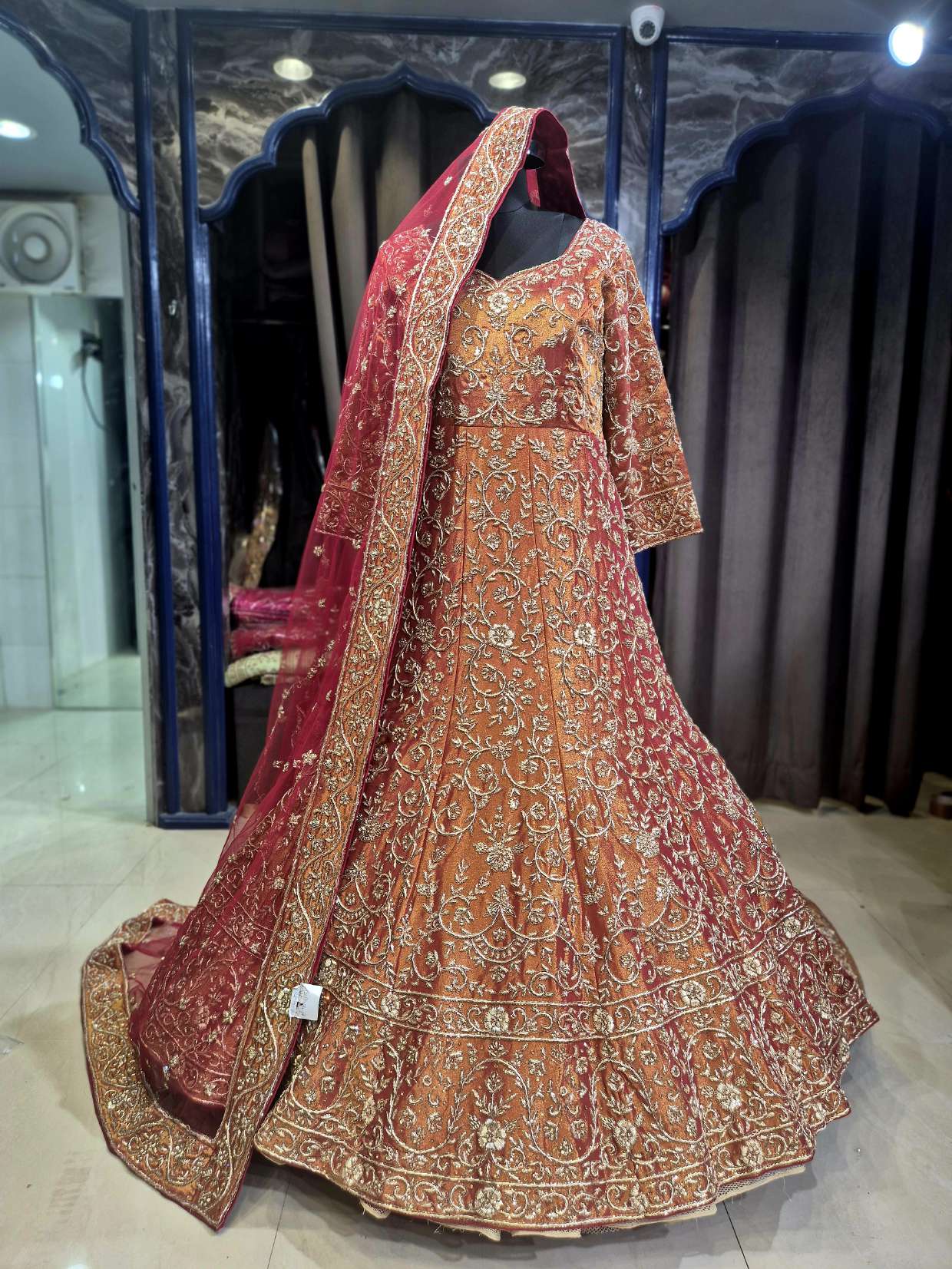 Shabnam — Rust Reception Trail Gown by Libas Couture